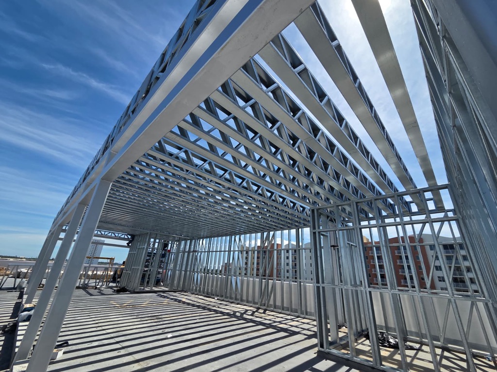 Precision-manufactured light steel roof framing